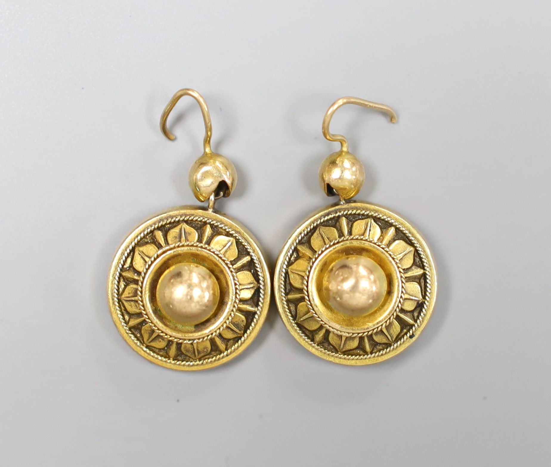 A pair of Victorian yellow metal circular drop earrings, 17cm, 6.1 grams.